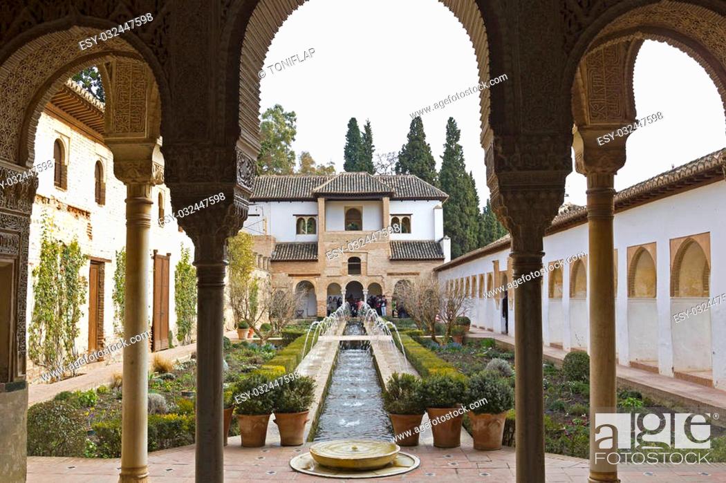 Stock Photo: View of the Patio de la Acequia in the Palacio del Generalife, part of the La Alhambra complex in Granada, Spain.