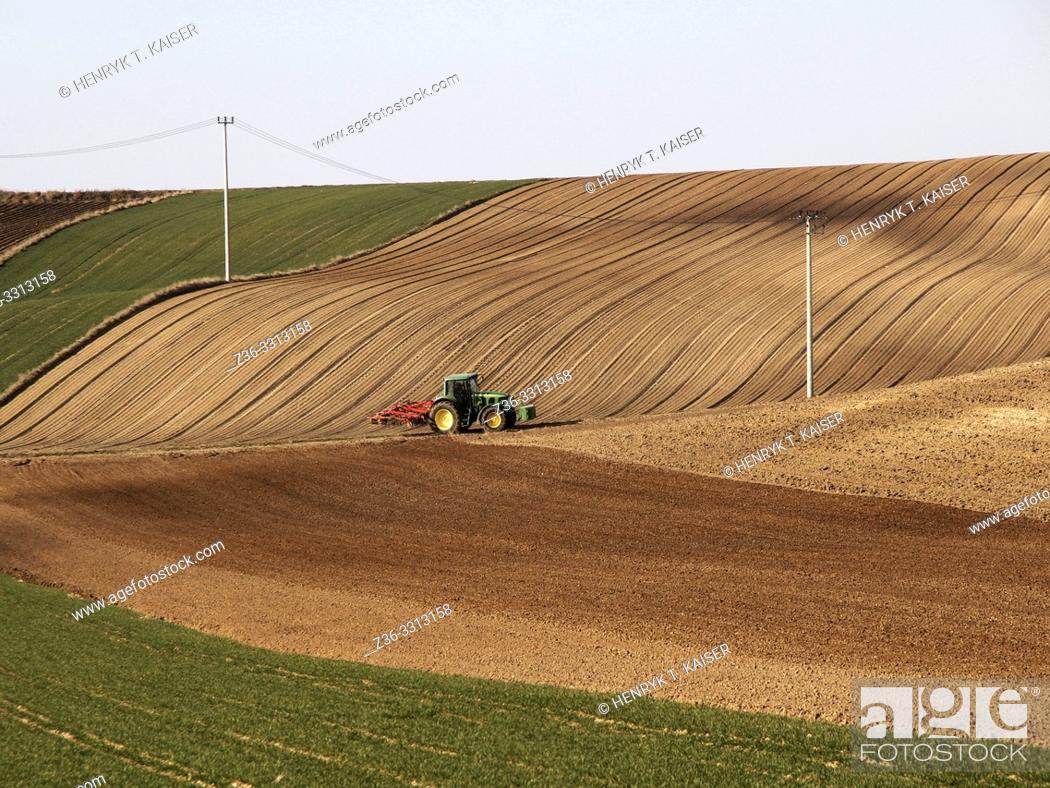 Stock Photo: Tractor plowing in Lasser Poland near Slomniki.