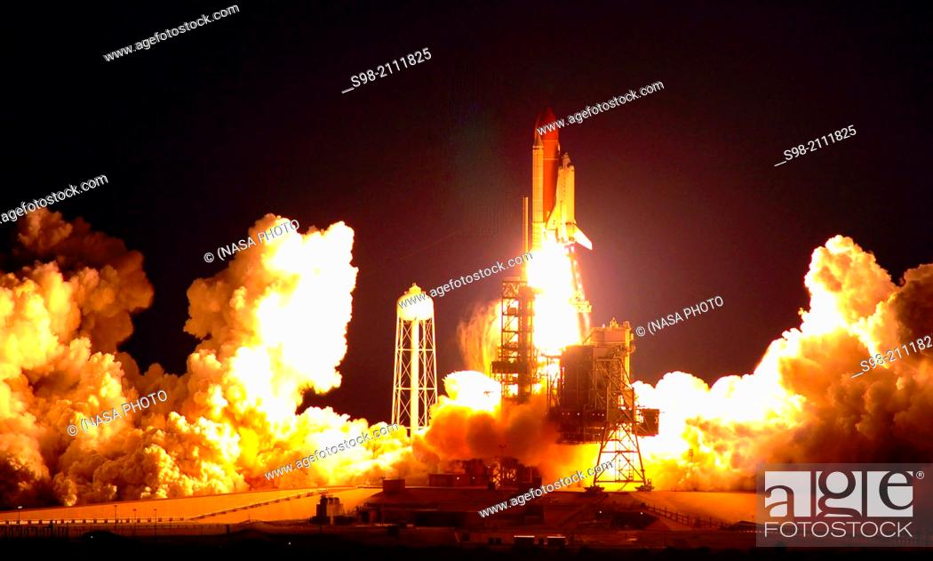 Stock Photo: Space Shuttle Endeavour, on the STS-123 mission, lights up Launch Pad 39A and the night sky. Liftoff was on time at 2:28 a.m. (EDT) March 11.
