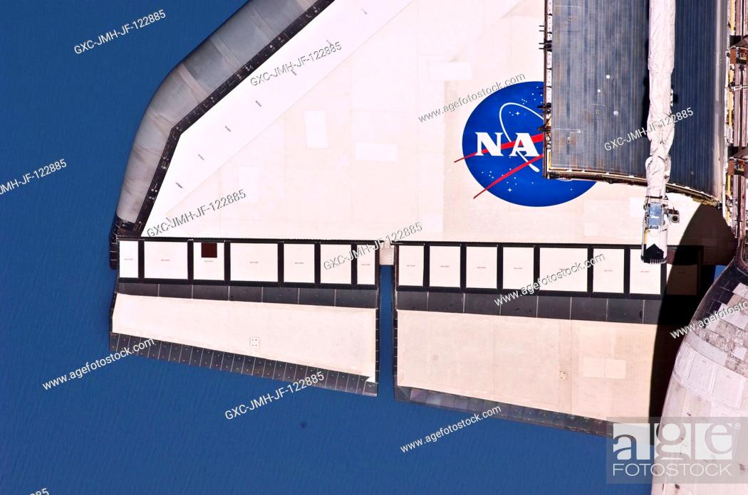 Stock Photo: This partial view of the port wing of the space shuttle Atlantis was provided by an Expedition 23 crew member during a survey of the approaching STS-132 vehicle.
