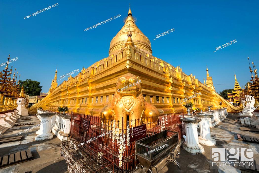 Stock Photo: Golden lion or chinthe, golden chedi, Shwezigon Pagoda or Shwezigon Paya, Nyaung U, Mandalay Region, Myanmar.