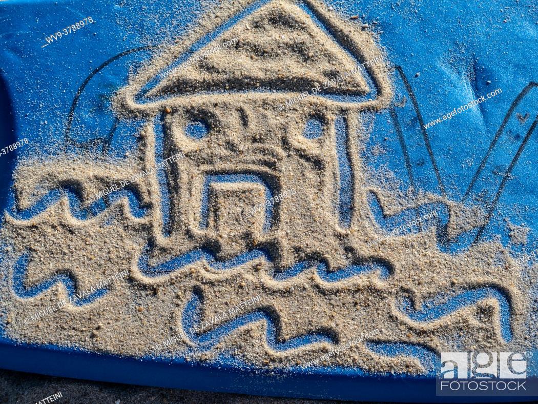 Photo de stock: A house drawn by a child in the sand.