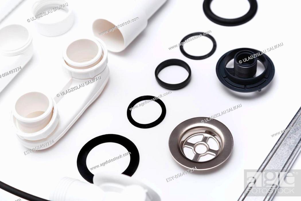 Stock Photo: Details plastic siphon kit for bathtub on a white background. Plumbing knolling on white background.