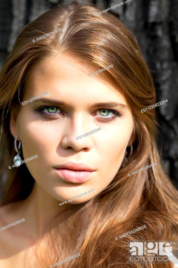 Stock Photo: Portrait close up of young beautiful woman.