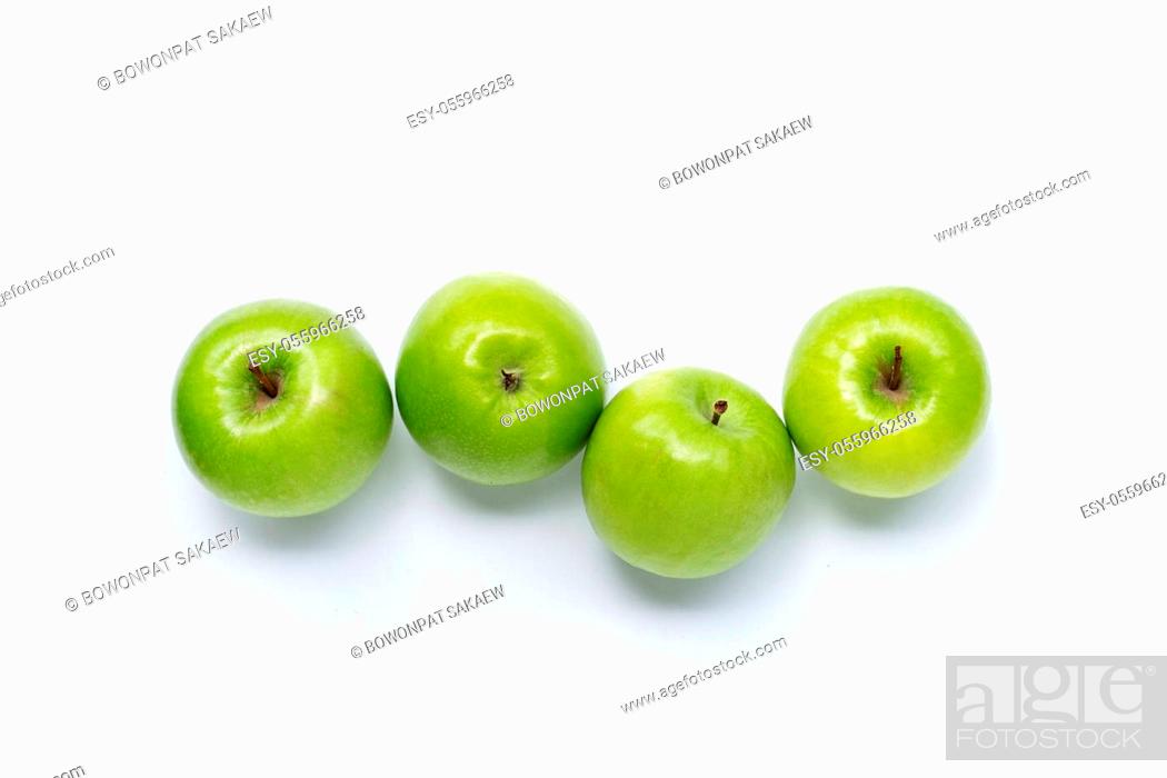 Photo de stock: Green apples on white background. Copy space.