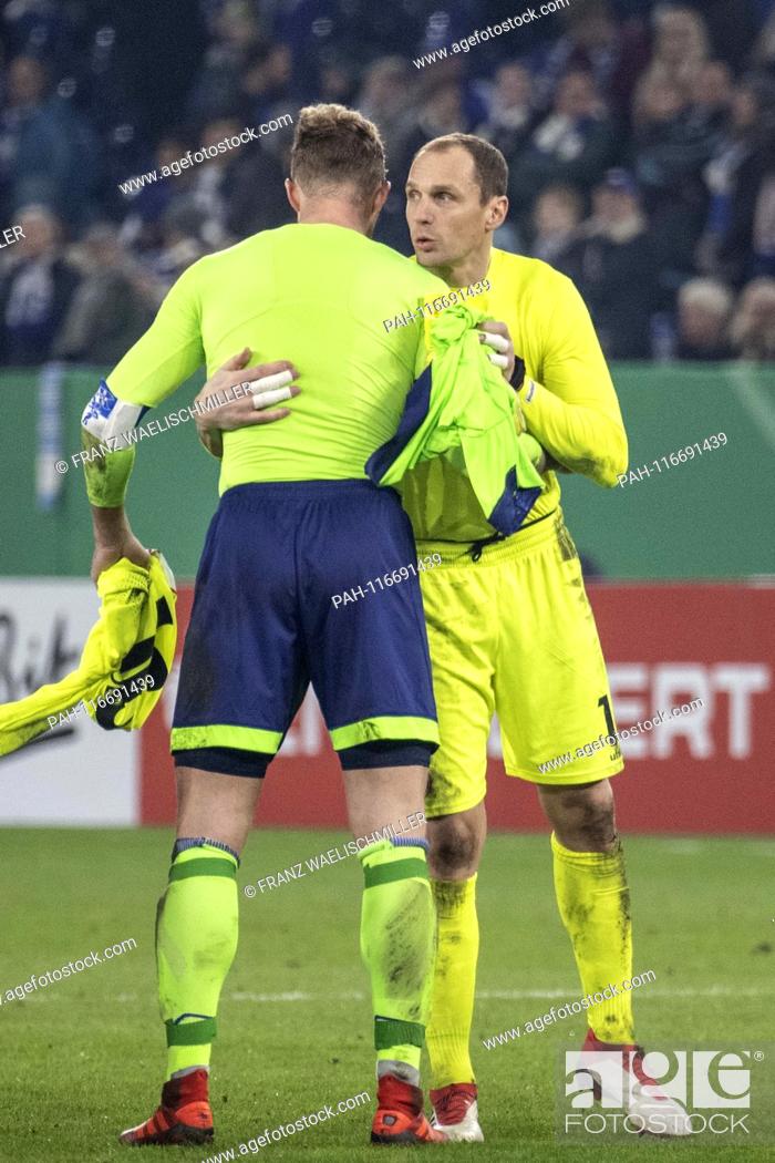 Stock Photo: goalkeeper Jaroslav DROBNY (D) and goalkeeper Ralf FAEHRMANN (FAHRMANN) (GE) say goodbye to each other after the game ends with a hug and jerk; Soccer DFB Pokal.
