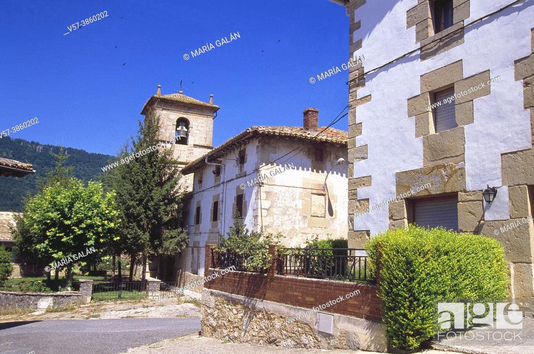 Stock Photo: Street and San Juan Bautista church. Baquedano, Navarra, Spain.