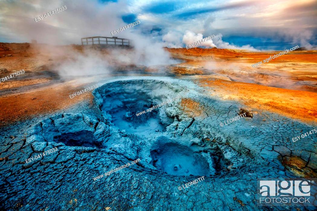 Stock Photo: Ominous view geothermal area Hverir (Hverarond) near Lake Myvatn. Popular tourist attraction. Dramatic and picturesque scene.