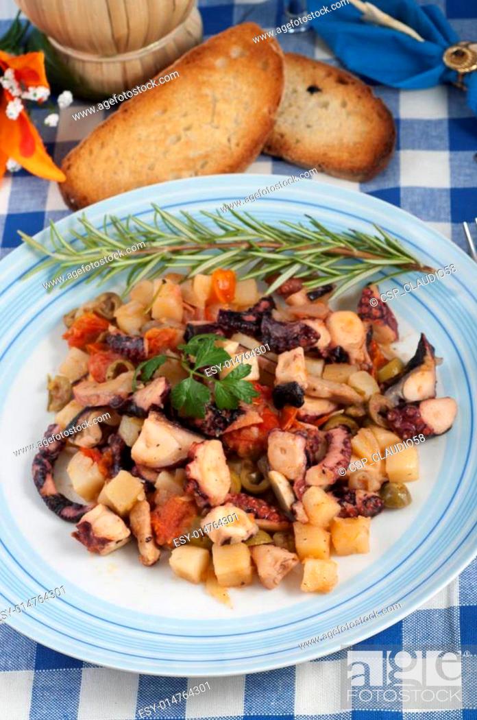 Stock Photo: octopus with potatoes and olives to the piñata.