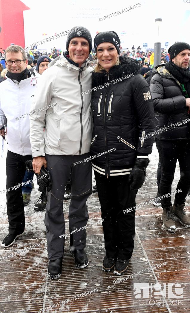 Stock Photo: 26 January 2019, Austria, Kitzbühel: Ski racer Maria Höfl-Riesch and her husband Marcus Höfl can be seen at the Hahnenkamm race after the second run of the.