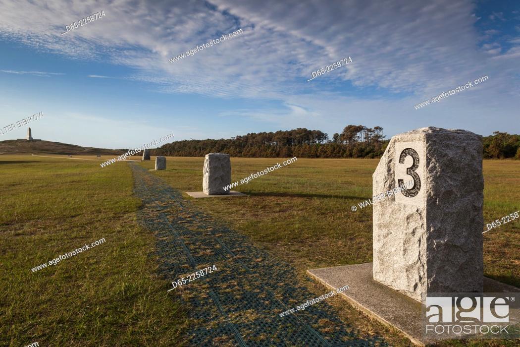 Stock Photo: USA, North Carolina, Kill Devil Hills, Wright Brothers National Memorial, stone marker for the third successful manned flight.