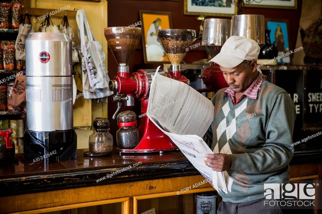 Customer reading the paper in Tomoca coffee house; Addis Ababa, Ethiopia,  Stock Photo, Picture And Rights Managed Image. Pic. AXI-2426442 |  agefotostock