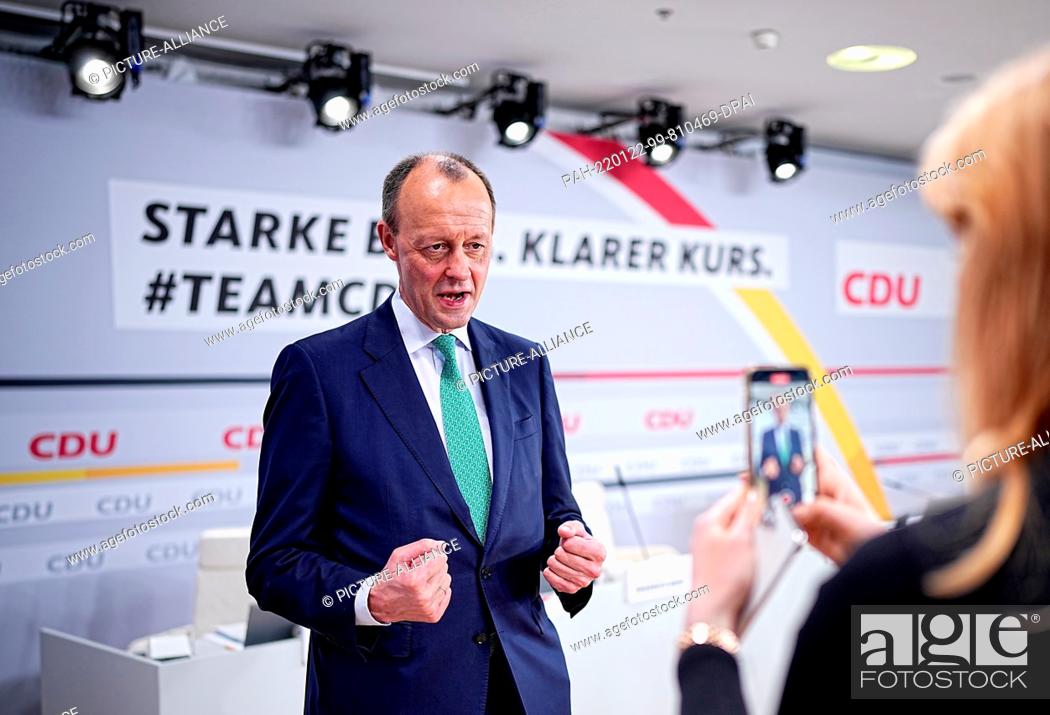 Stock Photo: 22 January 2022, Berlin: Friedrich Merz, future CDU federal chairman, records a post for the social media channels after the CDU's federal party conference at.