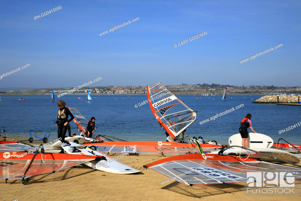 Stock Photo: Windsurfing from the slipway at the Weymouth & Portland Sailing Academy in Portland Harbour.