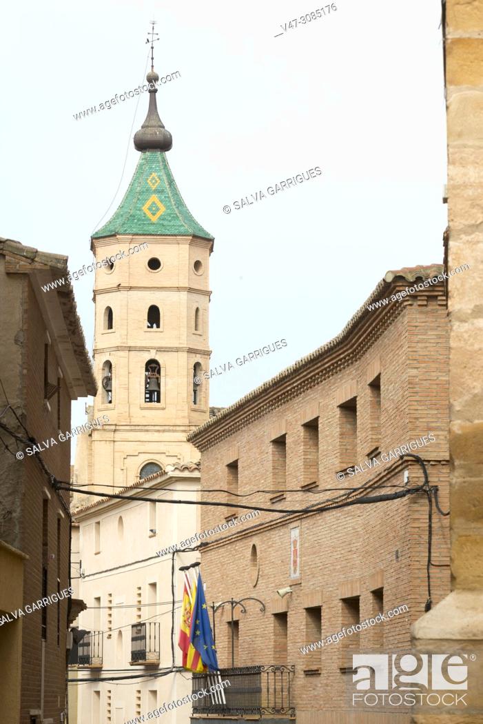 Stock Photo: Street of the church with the bell tower and the town hall of Fuendejalon, Aragon, Spain.