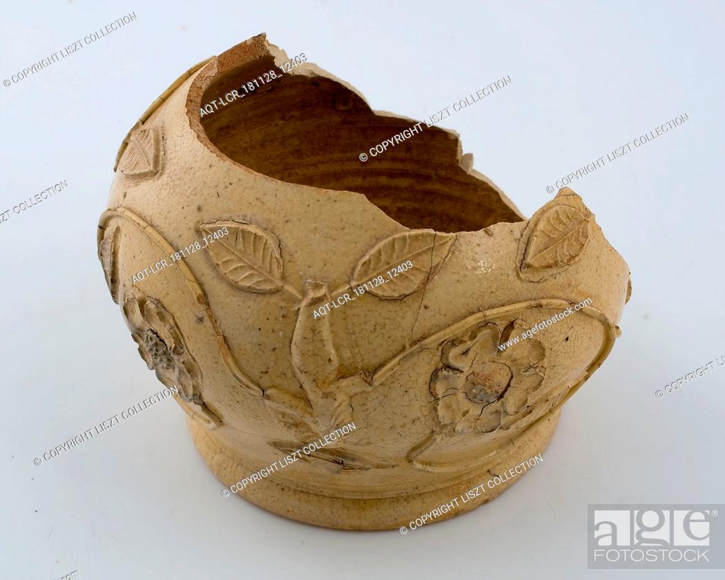 Stock Photo: Fragment stoneware jug with embossed roses and flowers, jug crockery holder soil find ceramic stoneware glaze salt glaze.
