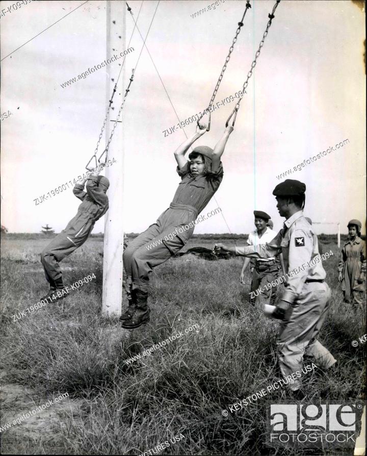 Stock Photo: 1944 - Miss Vietnam Trains to Drop in From the Air: And Hopes - The Conncevative Head of State Will Pernit Women Para troops - A dozen pretty 21-year-olds spend.