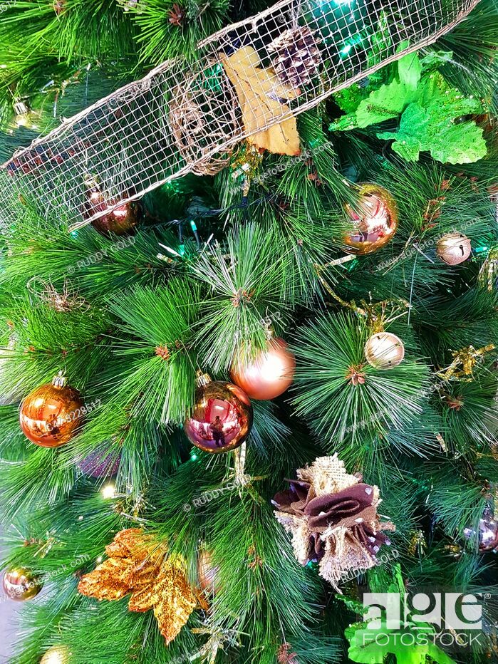 Stock Photo: Christmas decoration on a pine tree.