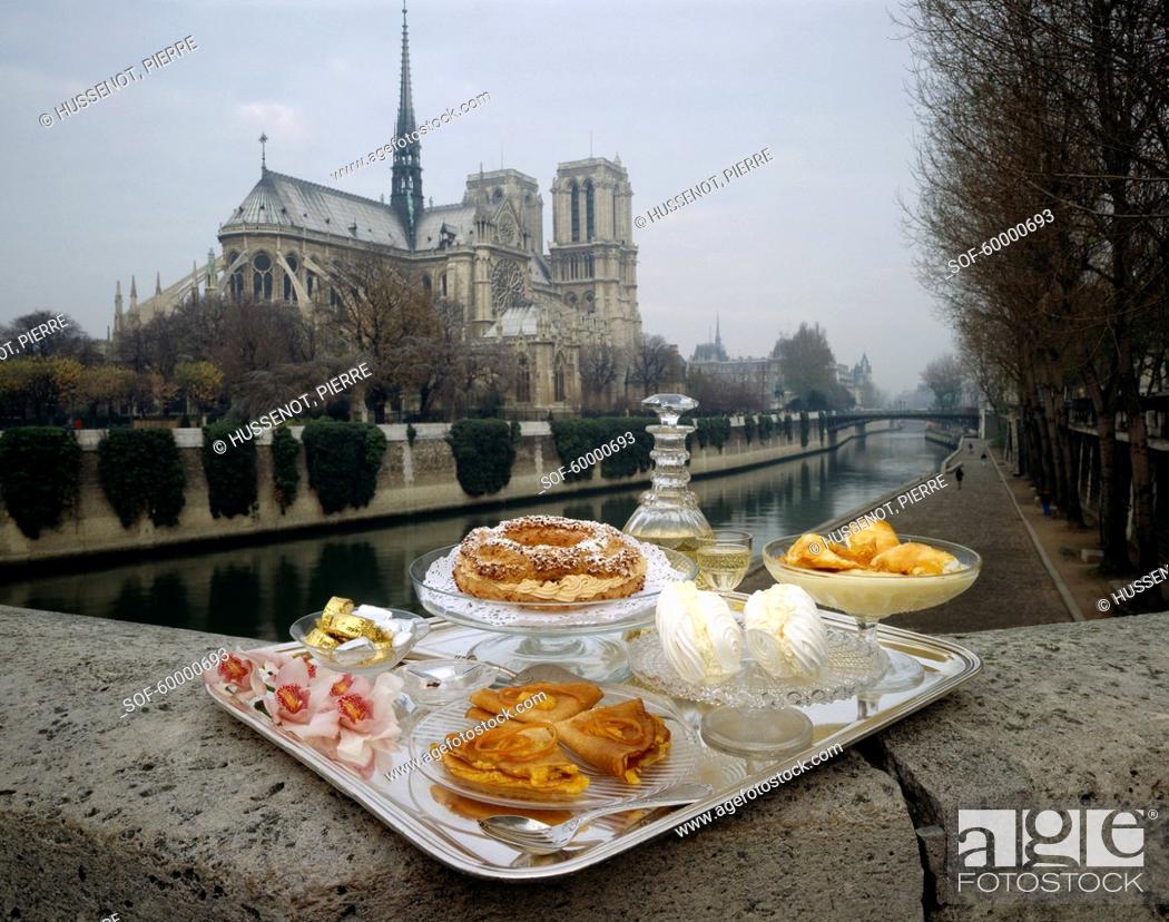 Stock Photo: Flower, River, Island, Morning, Cake, France, Tradition, Paris, Dish, Pastry, Prepared, Long, Dessert, Floating, Chocolate, River Seine, Seine, Candy, Classical, Selection, Meringue, Orchid, Speciality, Silverware, Crepe, Ambience, Ile-De-France, Suzette, Pastry Shop, Paris-Brest