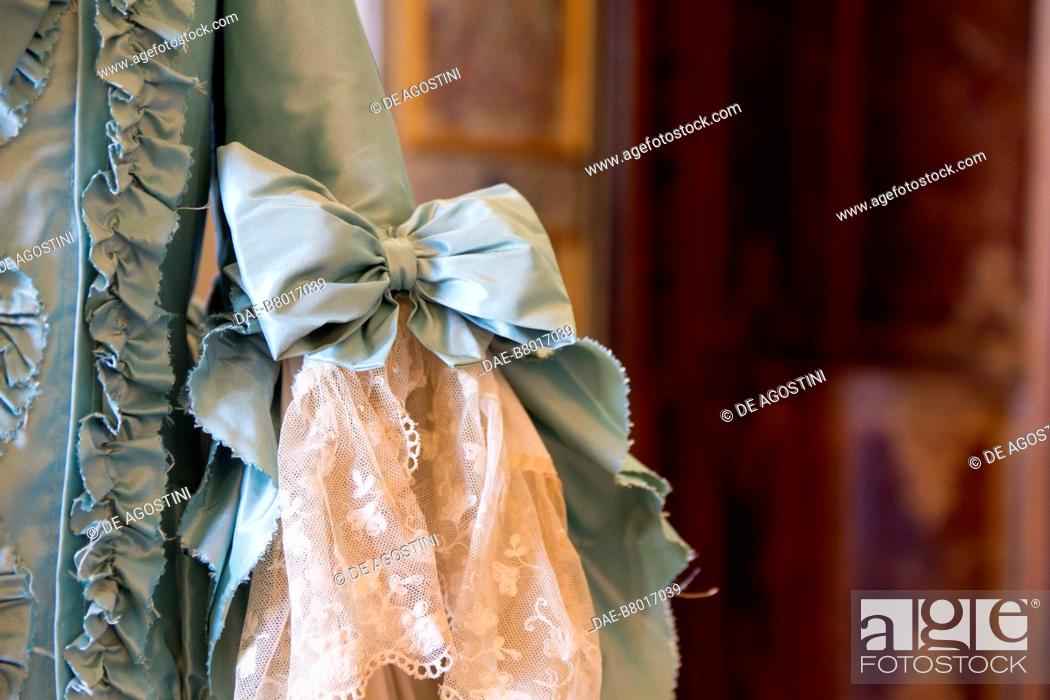 Stock Photo: Sleeve with lace and bow, woman's dress, court life in the Stupinigi hunting lodge, Italy, 18th century. Historical re-enactment.