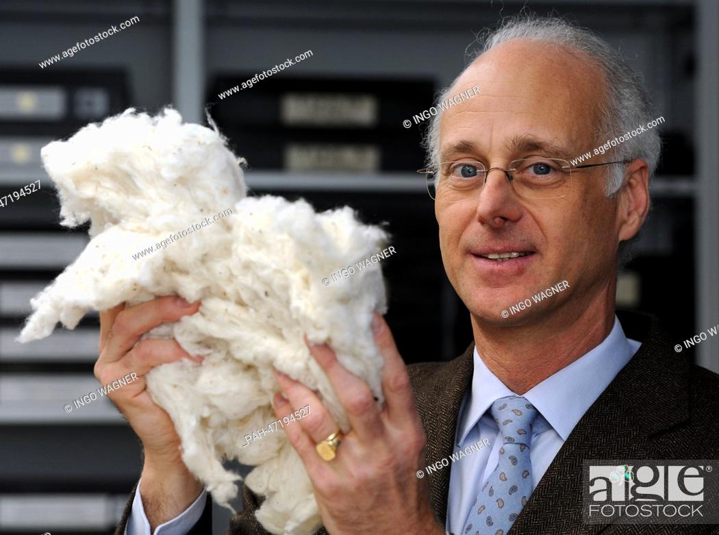 Stock Photo: The President of the Bremen Cotton Exchange, Fritz A. Grobien, is pictured in the sample room in Bremen, Germany, 17 March 2014.