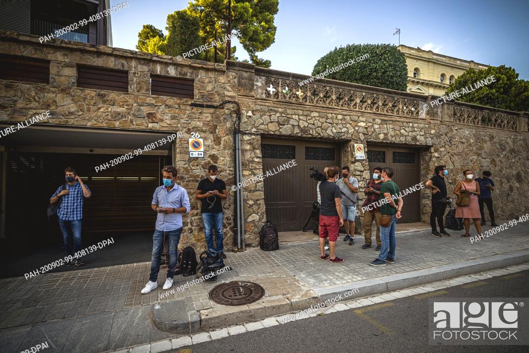 Stock Photo: 02 September 2020, Spain, Barcelona: Journalists and photographers wait for the father of football star Messi in front of his apartment in Barcelona.