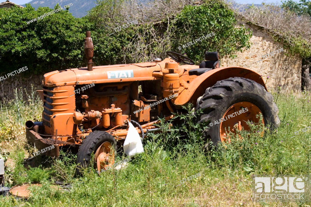 Stock Photo: Abandoned Fiat tractor.