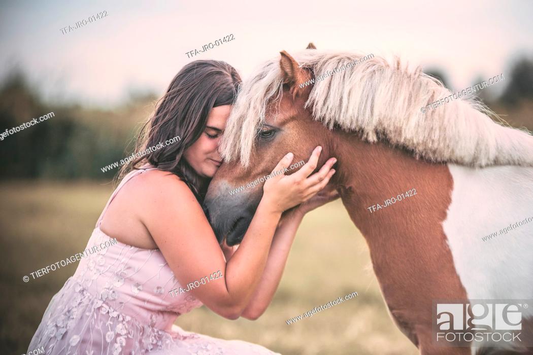 Stock Photo: woman and Mini Shetland Pony.