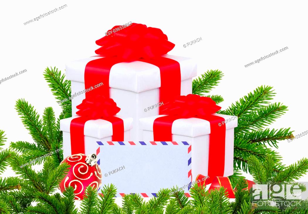Stock Photo: Christmas Gift Boxes, Decoration Balls and Christmas Tree Branch isolated on white.