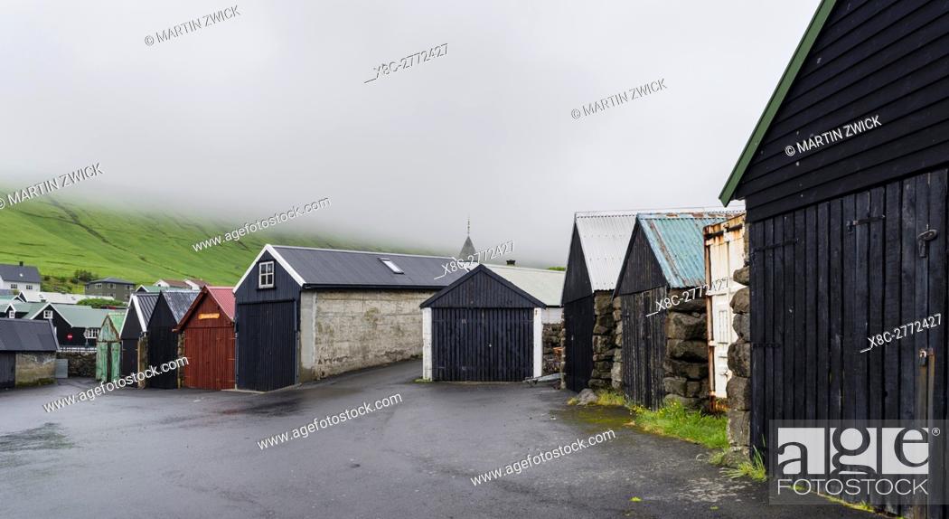 Stock Photo: Village Kvivik, boat sheds. The island Streymoy, one of the two large islands of the Faroe Islands in the North Atlantic.