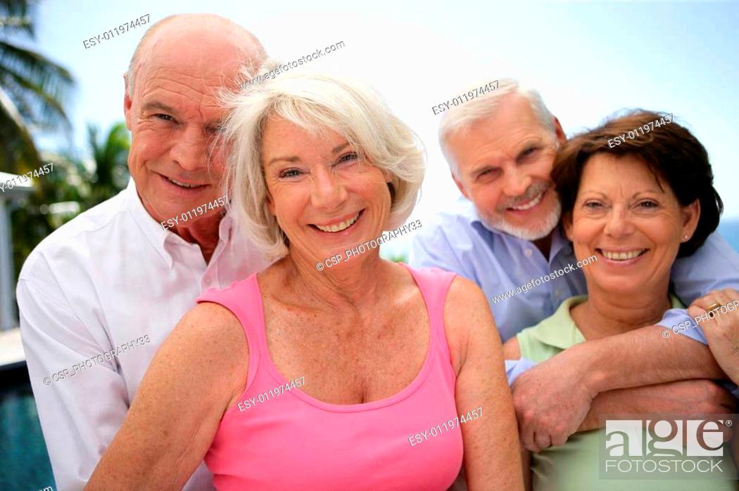 Stock Photo: two happy senior couples.