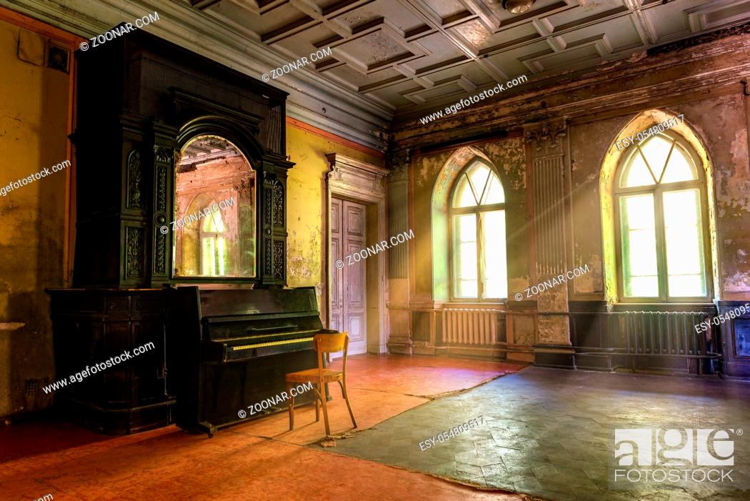 Stock Photo: Piano in the hall of abandoned Sharovskiy castle or Sharovka, Kharkov region.