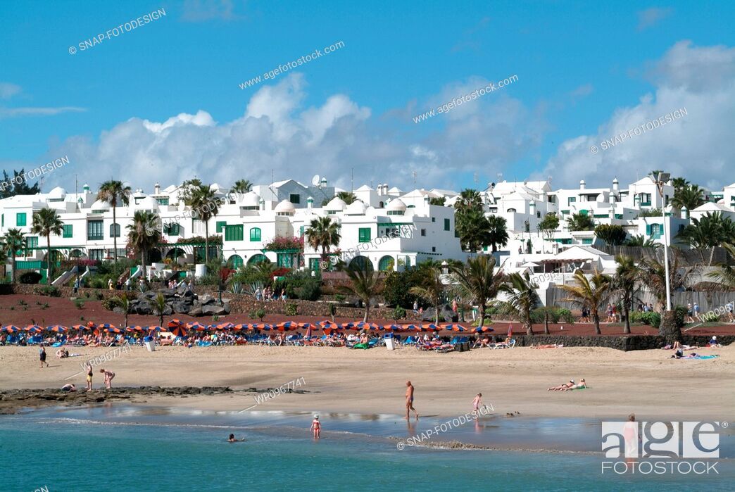 Stock Photo: Sea, Beach, Vacation, Hotel, Travel, Spain, Island, Tourism, Building, Screen, Development, Apartment, Flat, Playa, Geography, Read, Costa, Lanzarote, Touristic, Chaise, Teguise, Longues, Canarian, Cucharas, Studio Shot, Costa Teguise, Canary Islands