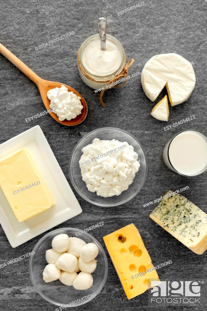 Stock Photo: different kinds of cheese, milk, yogurt and butter.