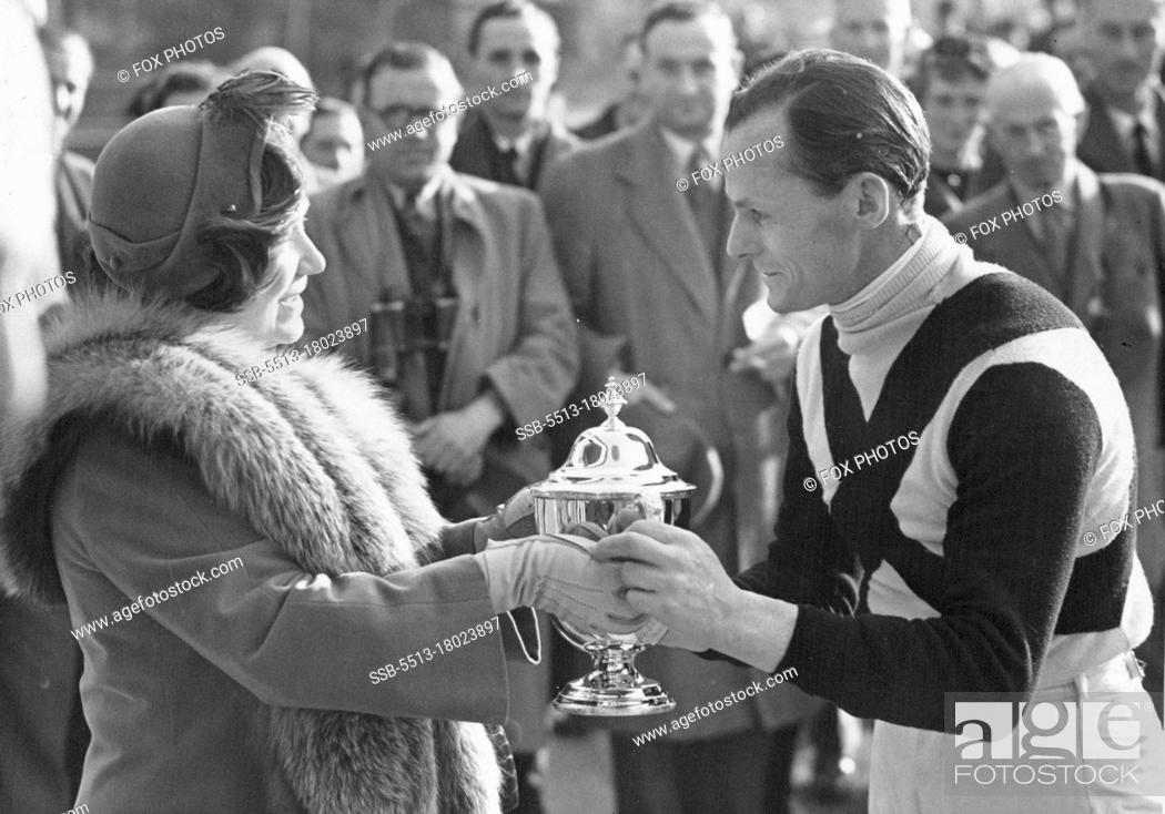 Stock Photo: Queen Mother at Sandown Park -- H.M. Queen Elisabeth the Queen Mother presenting the Grand Military Gold Cup to Lt. Col. C.H.