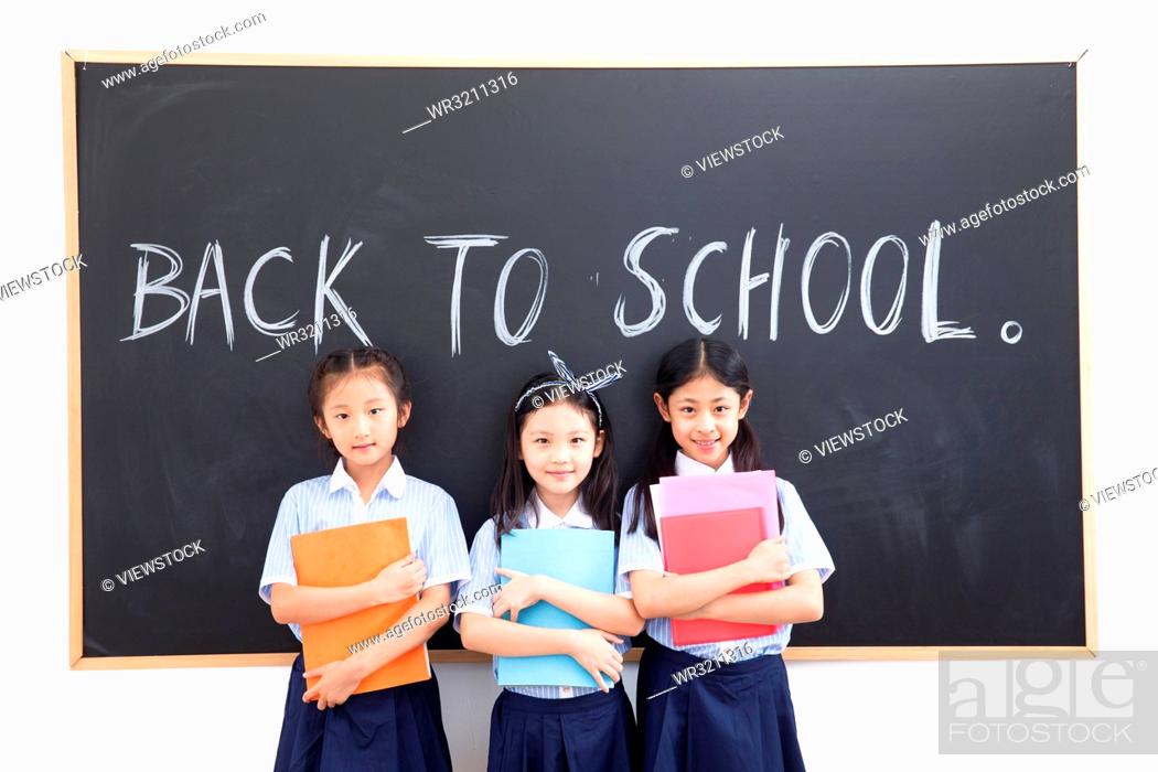 Stock Photo: Cute little girls in the classroom.