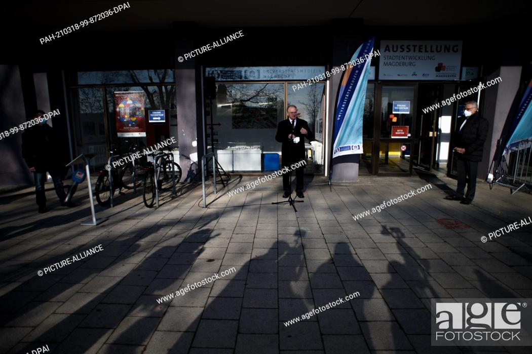 Stock Photo: 18 March 2021, Saxony-Anhalt, Magdeburg: Reiner Haseloff (CDU), Minister President of Saxony-Anhalt, speaks to media representatives in front of a test center.