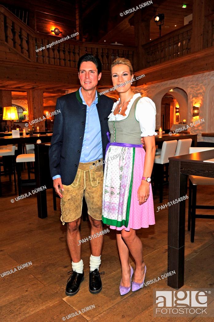 Stock Photo: Manager of sports Marcus Hoefl and his wife and former ski racer Maria Hoefl-Riesch attend the gala on occasion of 'Camp Beckenbauer' in Going, Austria.