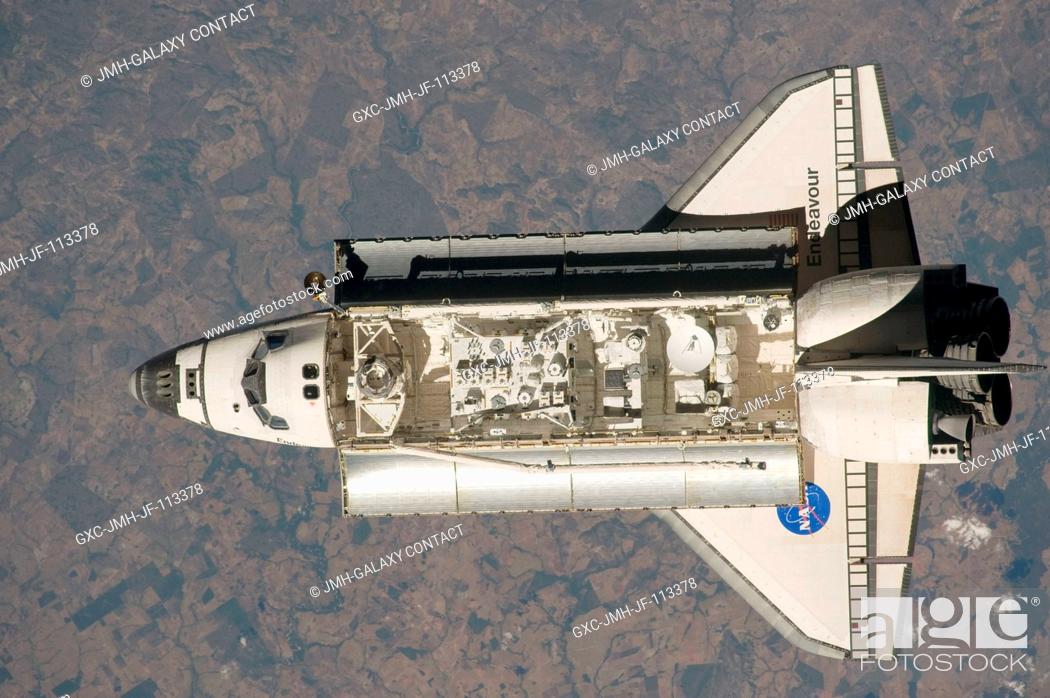 Stock Photo: This view of the Space Shuttle Endeavour was one of a series provided by an Expedition 20 crewmember prior to and during a survey of the approaching vehicle.