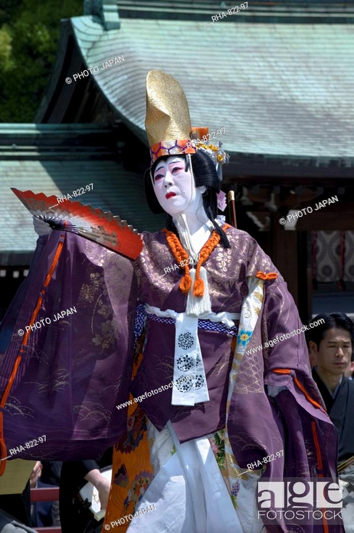 Stock Photo: Man dressed as a woman performing classical Japanese dance called hobu at Meiji Jingu shrine, Tokyo, Japan, Asia.
