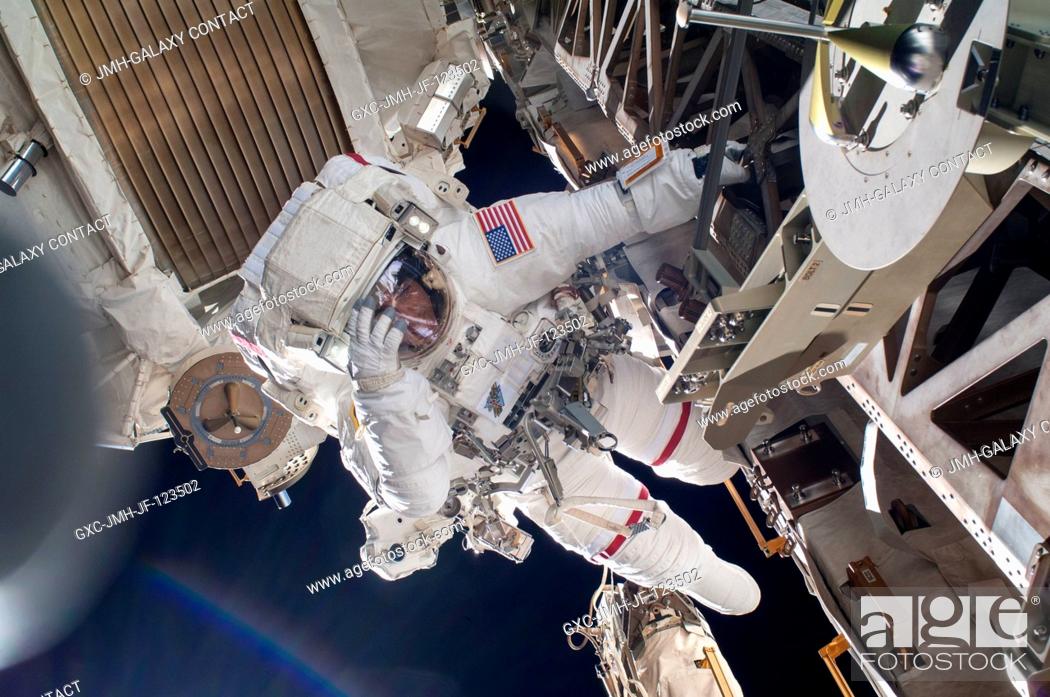 Stock Photo: NASA astronaut Chris Cassidy, Expedition 36 flight engineer, participates in a session of extravehicular activity (EVA) as work continues on the International.