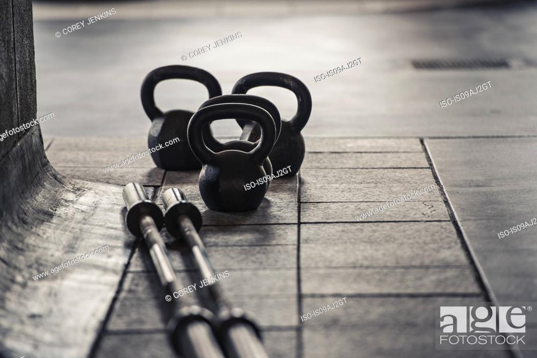 Stock Photo: Barbell and kettlebell weights.