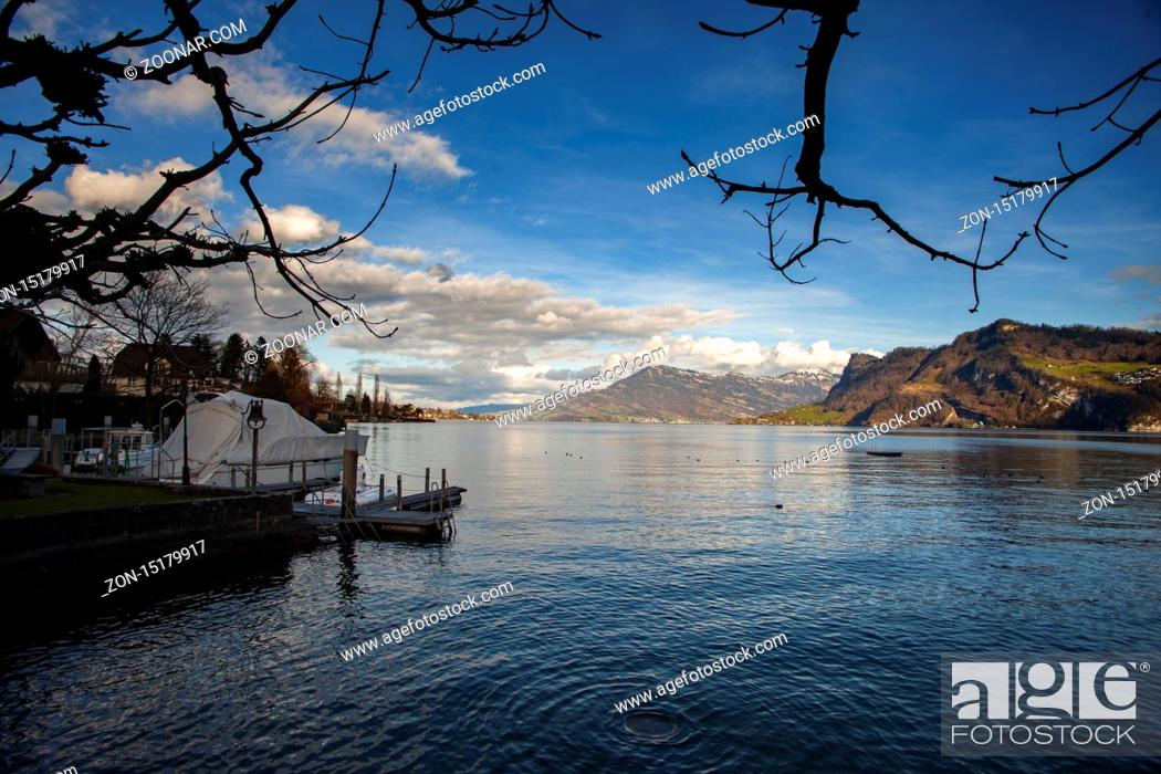 Stock Photo: lake lucerne with Rig with clue sky and clouds with trees.