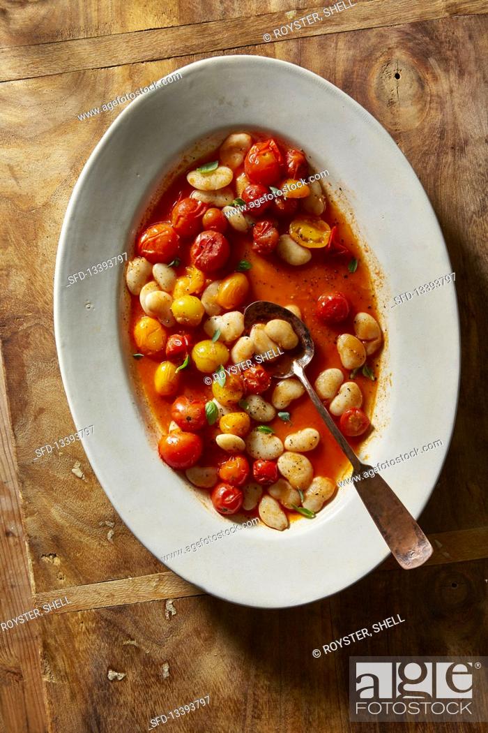 Stock Photo: Brothy beans with tomatoes.