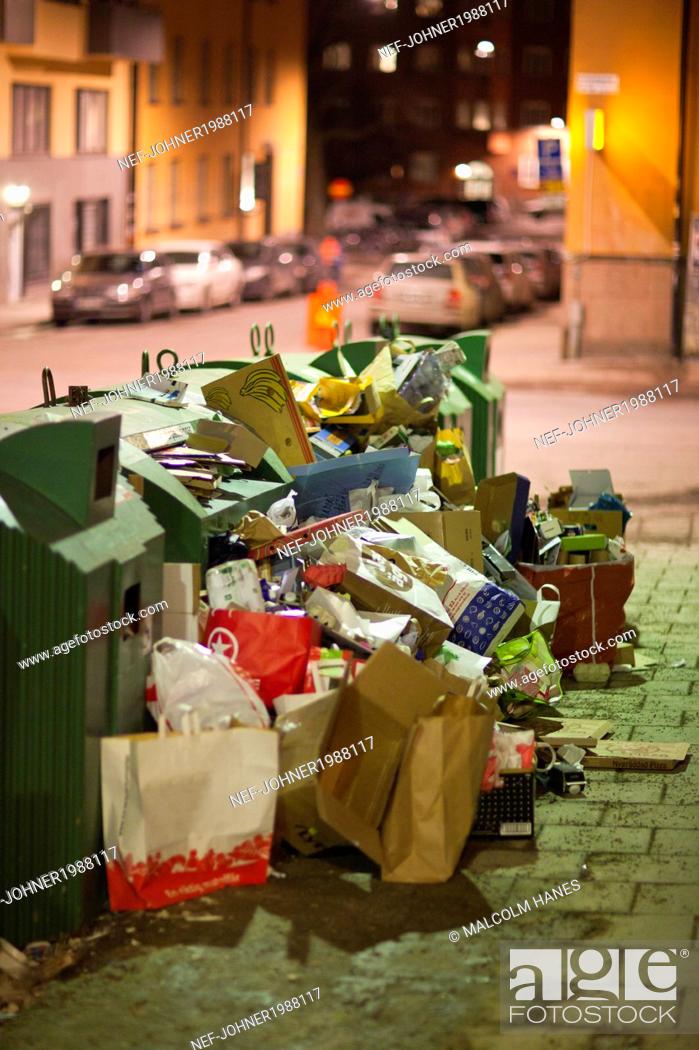 Stock Photo: Rubbish around bins.