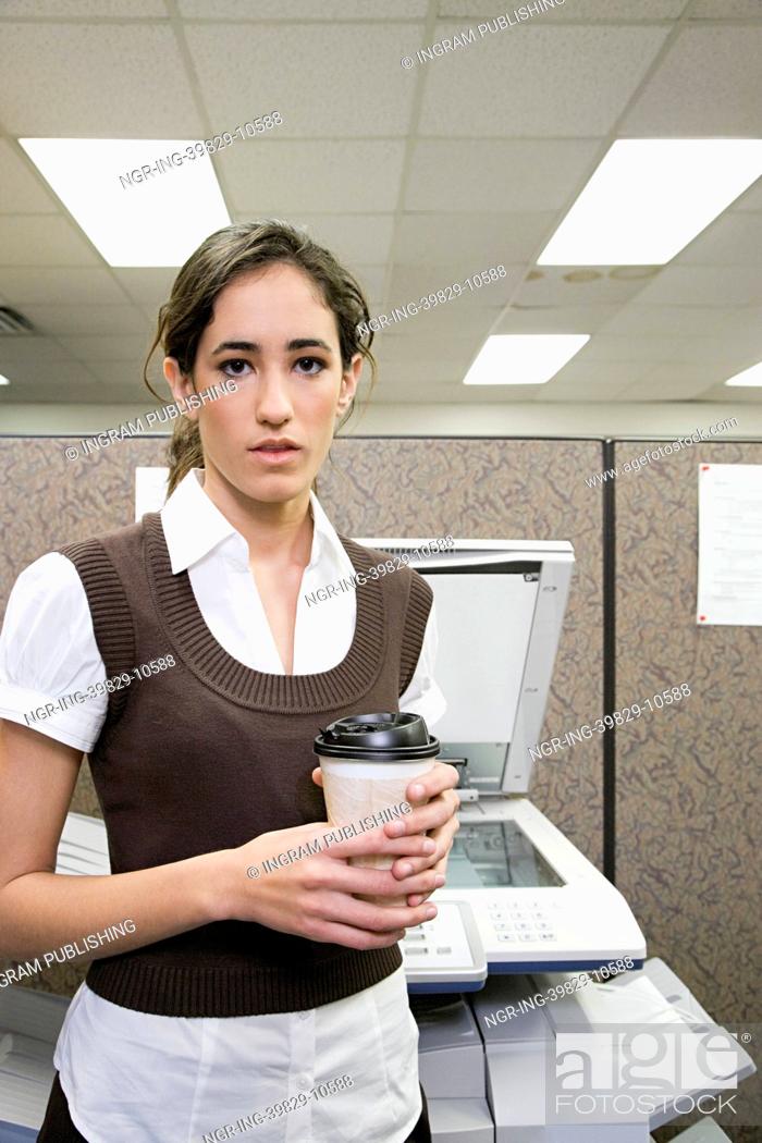 Stock Photo: Office worker with coffee.