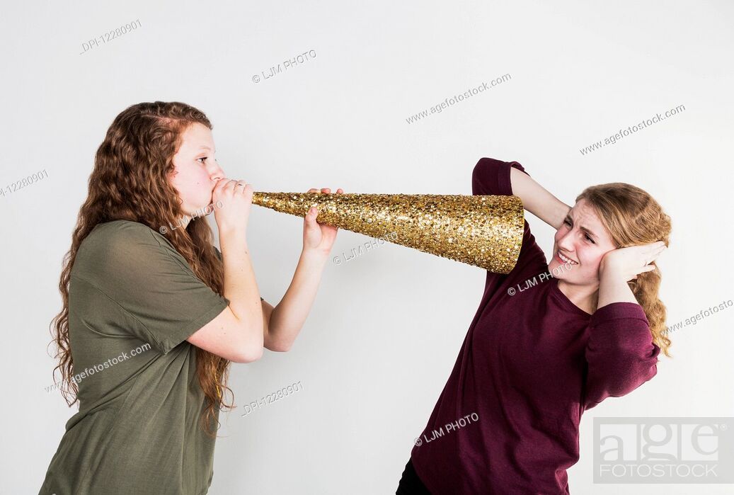 Blowing her friend