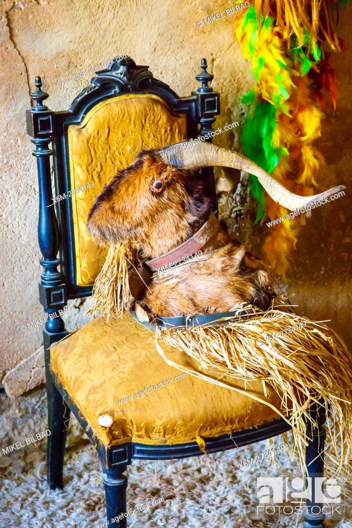 Stock Photo: He-goat head on a chair. Witchery Week 2016. Bargota, Navarre, Spain, Europe.