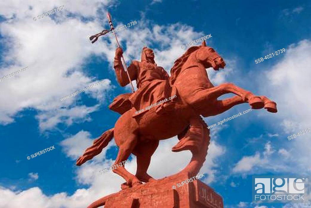 Stock Photo: Kyrgyzstan, between Sary Chelek and Bishkek, Statue of horseman.