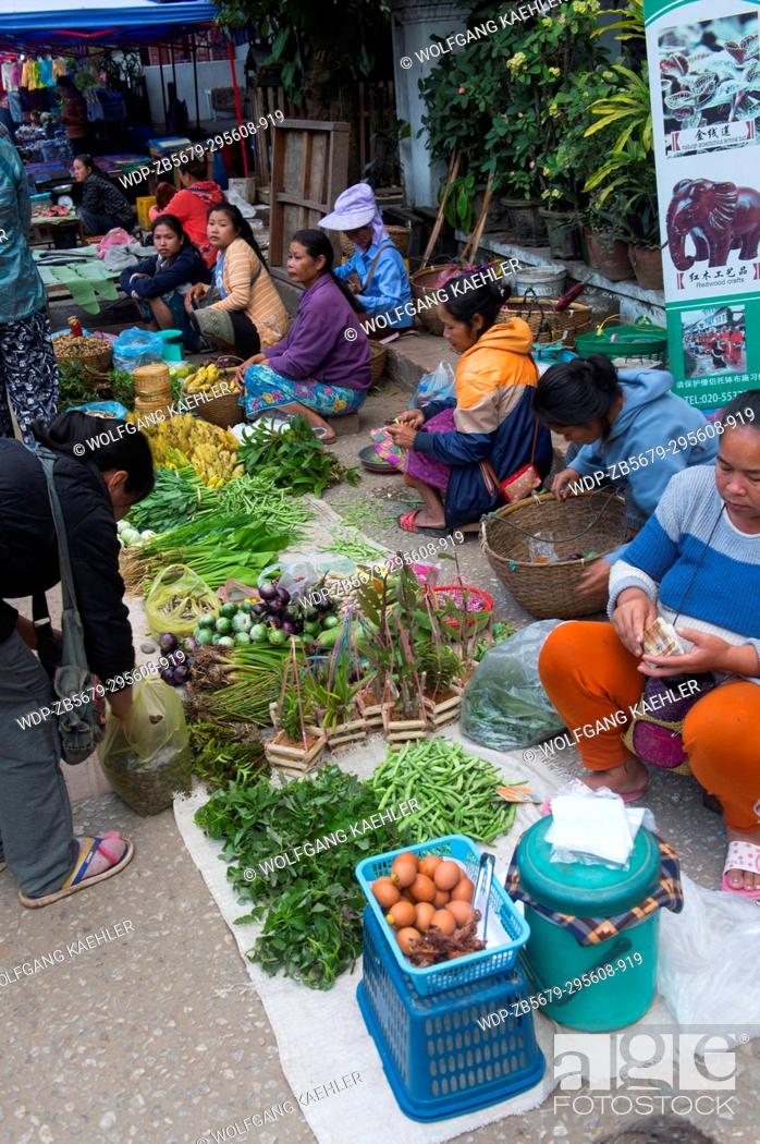 Stock Photo: A scene from the early morning market in the UNESCO world heritage town of Luang Prabang in Central Laos.